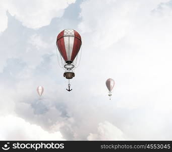 Aerostats flying over sky. Colorful aerostats flying in clear sky above summer sky