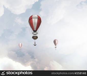 Aerostats flying over sky. Colorful aerostats flying in clear sky above summer sky