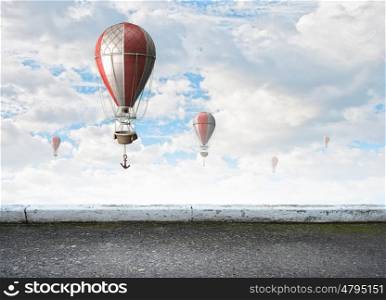Aerostats flying over sky. Colorful aerostats flying in clear sky above summer sky