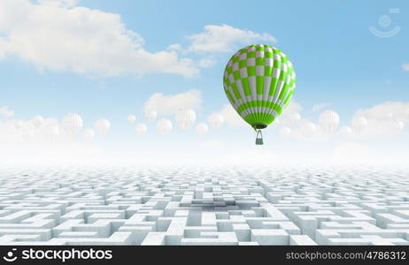 Aerostats in sky. Conceptual image with balloons flying high in sky