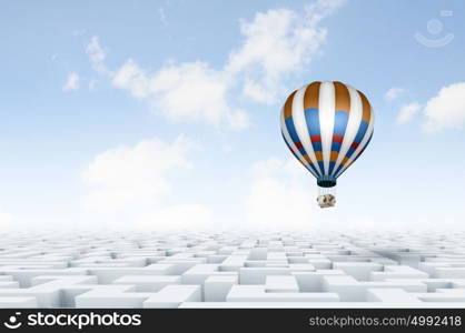 Aerostats in sky. Conceptual image with balloons flying high in sky