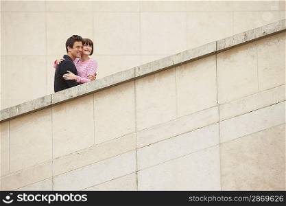 Affectionate Couple Sightseeing on Steps