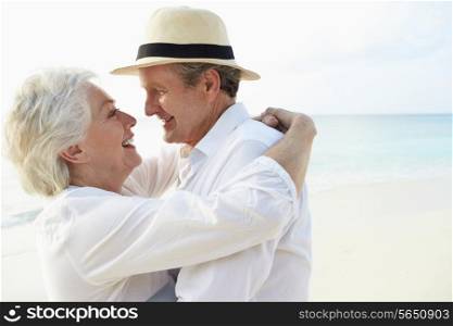 Affectionate Senior Couple On Tropical Beach Holiday