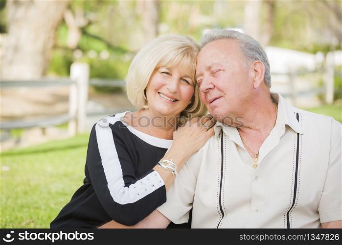 Affectionate Senior Couple Portrait Outside At The Park.