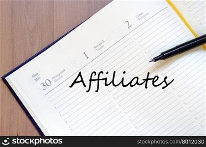 Affiliates text concept write on notebook