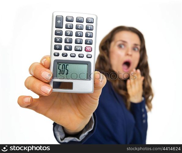 Afraid business woman showing calculator with sos inscription