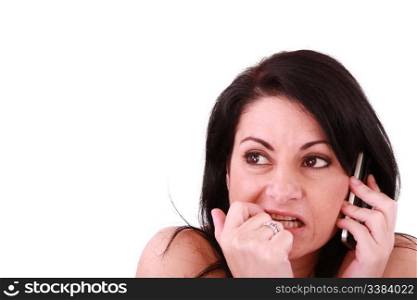 afraid looking woman with a phone isolated on white