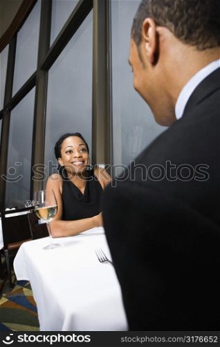 African-American couple having drinks at the Tower of the Americas in San Antonio, Texas.