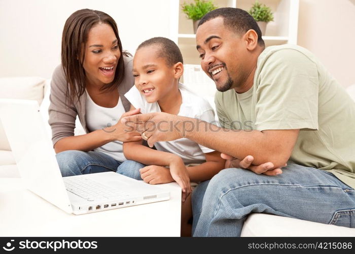 African American Family Using Laptop Computer