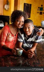 African-American woman and teen in kitchen