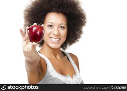 African American young woman holding and showing a red apple