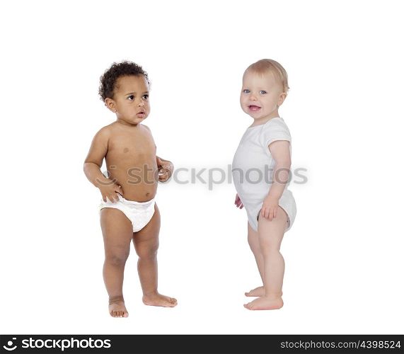 African and caucasian babies isolated on a white background