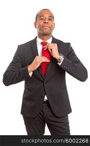African business man fixing his tie, siolated over white