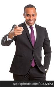 African business man poiting at you, isolated over white