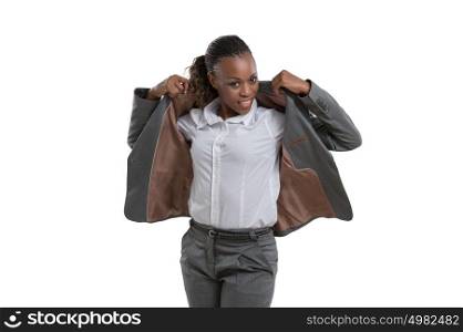 African business woman putting on jacket isolated on white background
