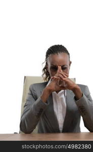 African business woman sitting at her desk and thinking isolated on white background