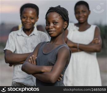 african children with arms crossed