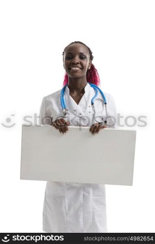 African doctor woman holding blank copyspace card board, concept of advertisement product, empty copy space, wearing white medical suit with stethoscope. Isolated over white background