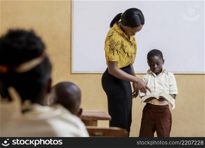 african kids having lesson school