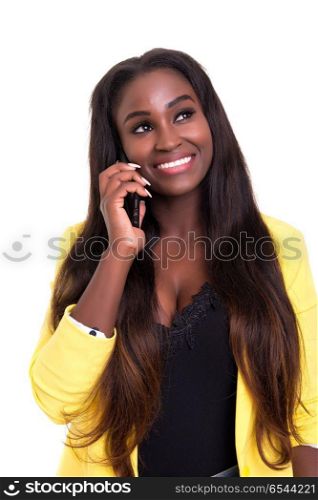 African woman at the phone. Young beautiful african woman at the phone, isolated over white background