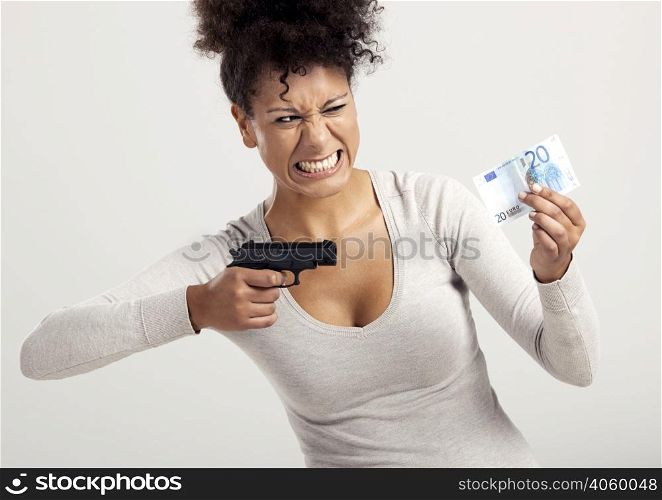 African woman shooting a euro banknote, great concept for the global crises