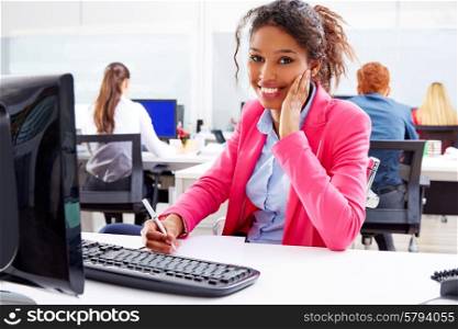 african young businesswoman working in office with computer