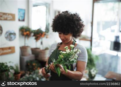 afro african woman holding bunch flowers