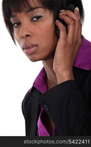 Afro-American businesswoman talking on her cell