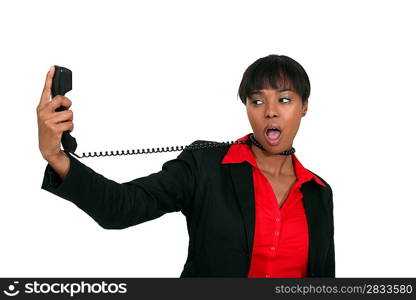 Afro-American businesswoman trying to hang herself with the phone cable