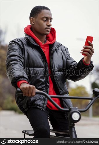 afro american man his bicycle