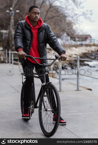 afro american man riding his bicycle 2