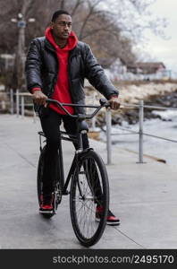 afro american man riding his bicycle 2