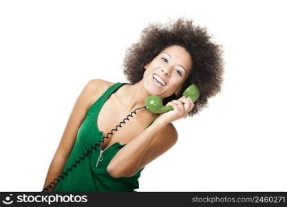 Afro-American young woman answering a call, isolated on white background