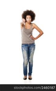 Afro-American young woman isolated on white doing a thumbs down signal with her hand