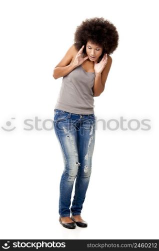 Afro-American young woman looking down surprised with something, isolated on white