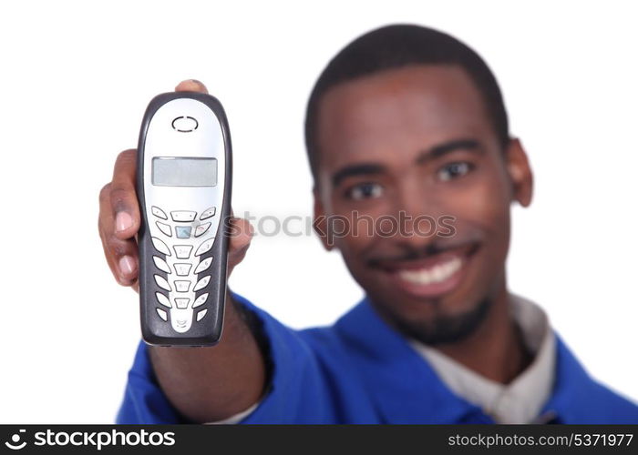 Afro man holding phone on white background