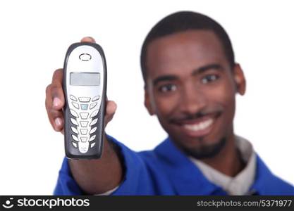 Afro man holding phone on white background