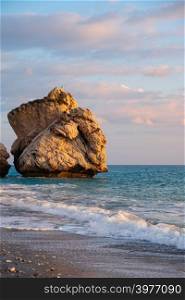 Afternoon view of breaking waves at the beach around Petra tou Romiou, in Paphos, Cyprus. It is considered to be Aphrodite&rsquo;s birthplace in Greek mythology.