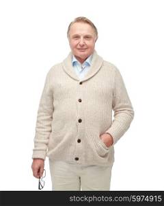 age, fashion and people concept - smiling senior man in cardigan