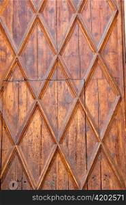 Aged golden wood door from Lonja of Palma de Majorca in Spain