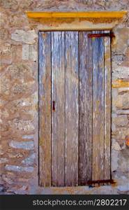 Aged grunge wood door stripes texture weathered in mediterranean sea