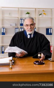 Aged lawyer working in the courthouse  