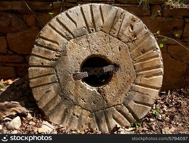 Aged old mill millwheel stone wheel in Cuenca Spain