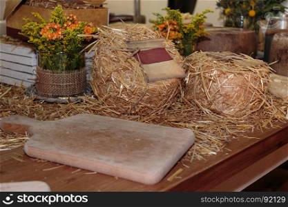 Aged Pecorino Cheese Cover with Decorative Straw and Wooden Cutting Board