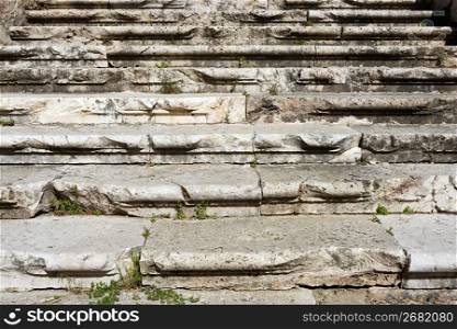 aged weathered ancient roman stairs castle stairway in Spain