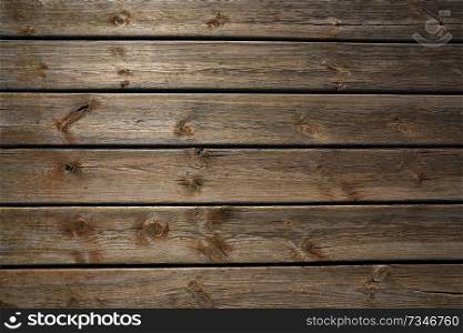 Aged weathered wood plank board on a beach background