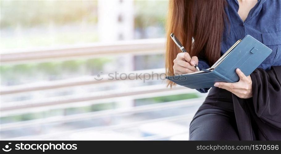 Agenda of planner woman schedule and organize appointment 2020 Calendar Event. Smart Business woman note and schedule to set timetable organize schedule. Woman hands writing on Agenda.Timeline concept