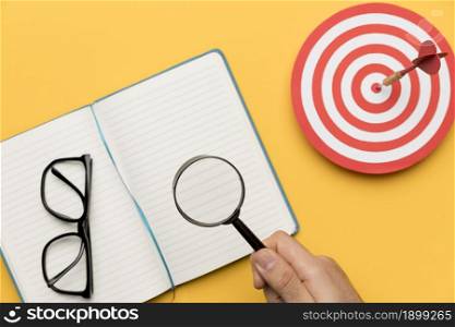 agenda with dartboard magnifier. Resolution and high quality beautiful photo. agenda with dartboard magnifier. High quality beautiful photo concept