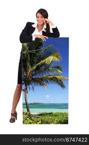 Agent with a poster of a tropical beach