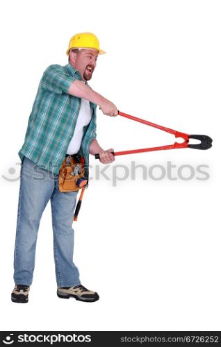 Aggressive man using bolt-cutters